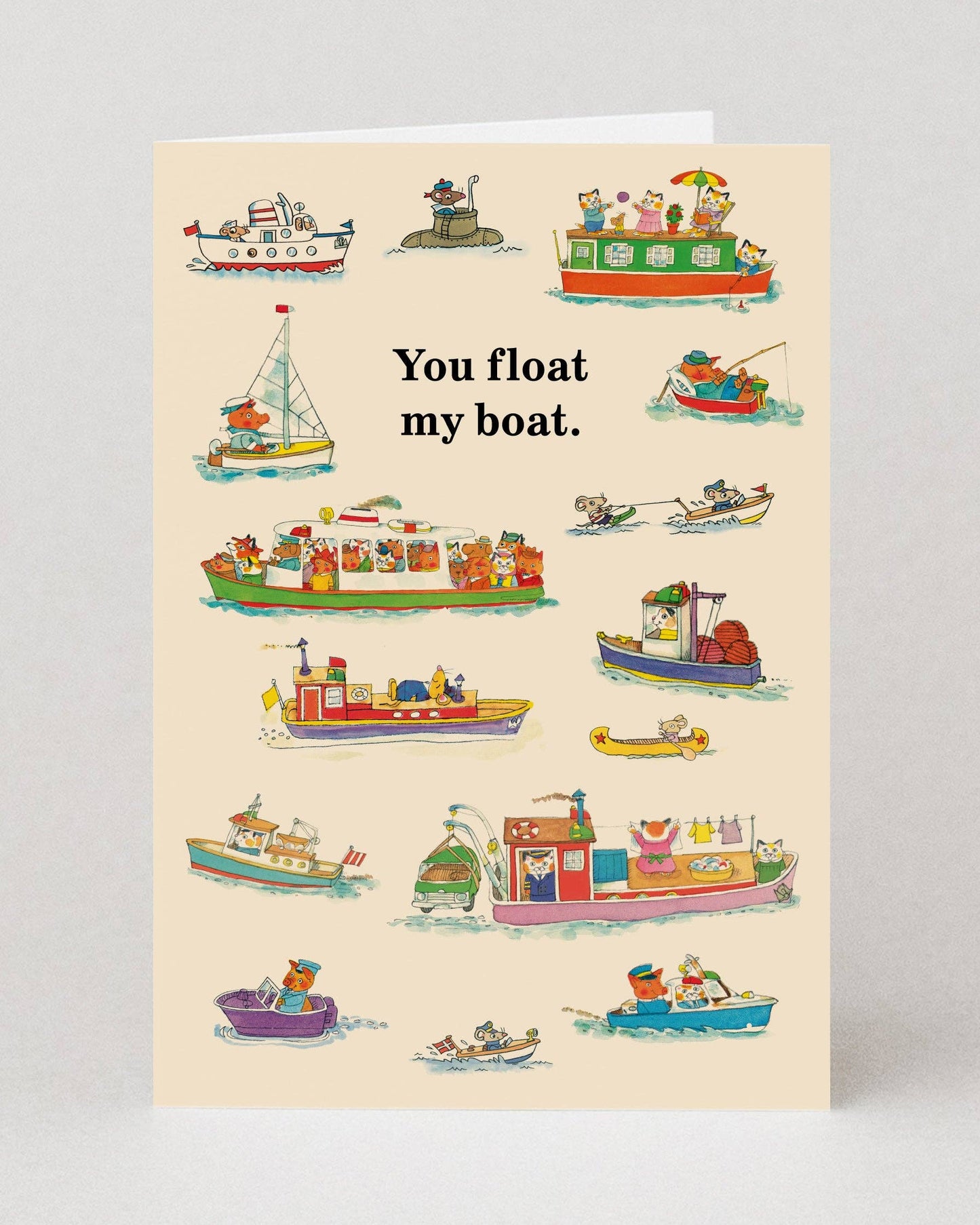 Card with Richard Scarry illustrations of boats and the text 'You float my boat.' on a beige background